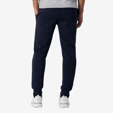 Champion Authentic Athletic Apparel Tapered Sportbroek in Blauw
