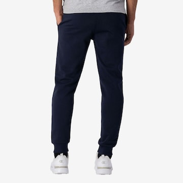 Effilé Pantalon de sport Champion Authentic Athletic Apparel en bleu