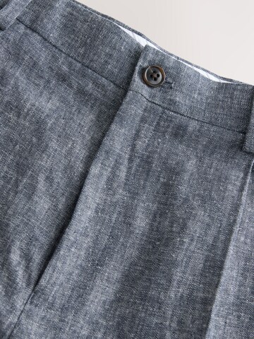 Slimfit Pantaloni con pieghe di Next in blu