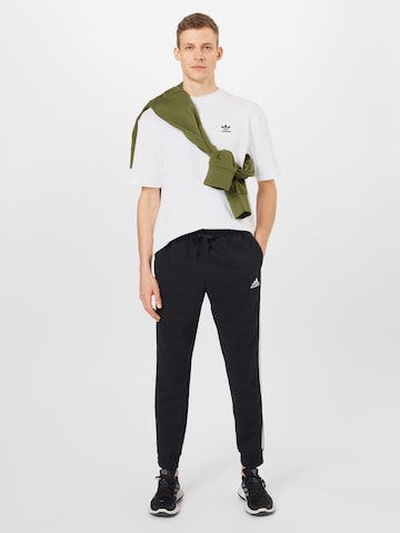 ADIDAS SPORTSWEAR Tapered Sportnadrágok 'Essentials Fleece Tapered Cuff 3-Stripes' - fekete