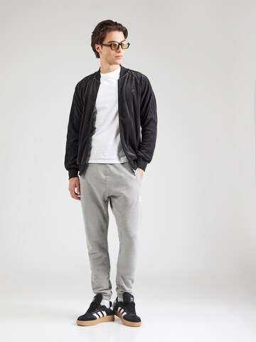 ADIDAS ORIGINALS Конический (Tapered) Штаны 'ESS' в Серый