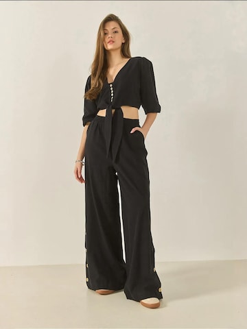 Completo pantalone di Bianco Lucci in nero