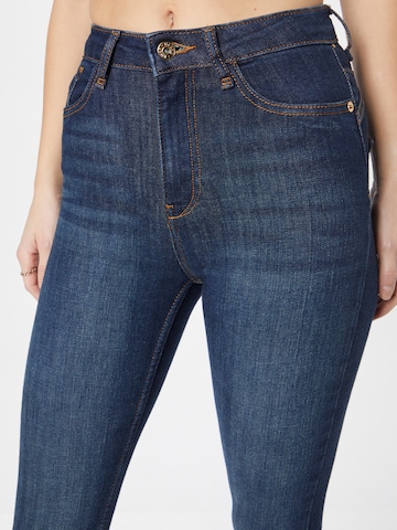 River Island - Skinny Calças de ganga em azul