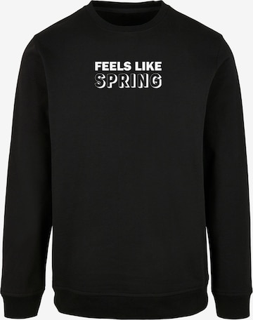 Merchcode Sweatshirt 'Spring - Feels Like' in Black: front