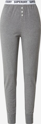 Effilé Pantalon de pyjama Superdry en gris : devant