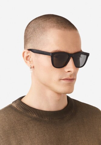 Lunettes de soleil 'One Raw' HAWKERS en noir