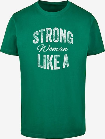 T-Shirt 'Strong Like A Woman' Merchcode en vert : devant