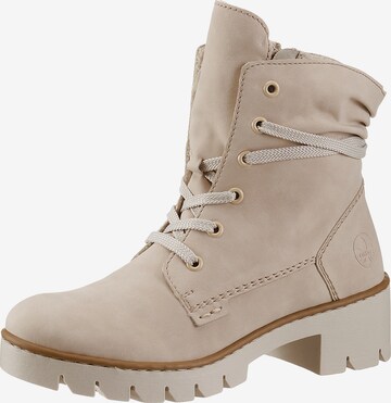 Bottines à lacets Rieker en beige : devant