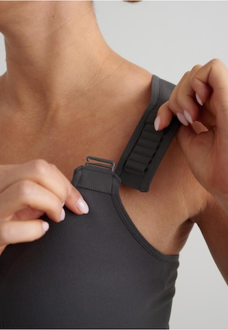 Bustino Reggiseno sportivo di Aim'n in grigio