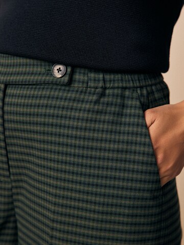 Wide leg Pantaloni con piega frontale di Next in verde