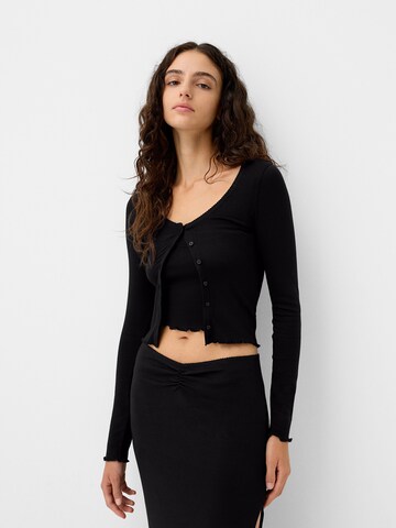 Bershka Knit cardigan in Black: front