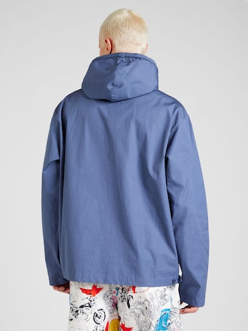 Veste mi-saison 'FIELD' Nike Sportswear en bleu