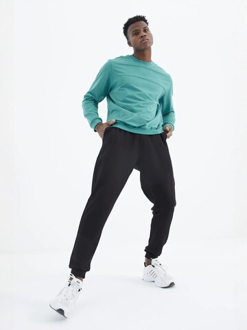 Tuta da jogging di Tommy Life in grigio