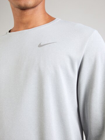 NIKE Performance shirt 'MILER' in Grey