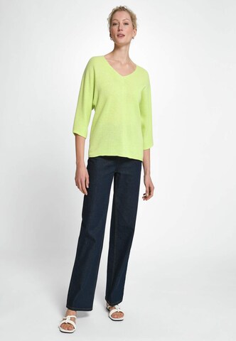 Pull-over include en jaune