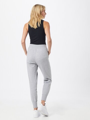 Effilé Pantalon de sport 'Rival' UNDER ARMOUR en gris