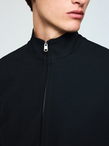 Next Jacke 'Motionflex' in Schwarz