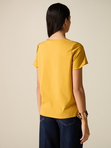 Maglietta di oltre in giallo