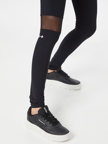 NEBBIA Skinny Sports trousers in Black