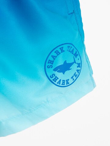 Cool Club Board Shorts in Blue