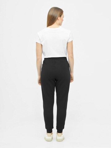 NIKIN Tapered Trousers 'Tree' in Black