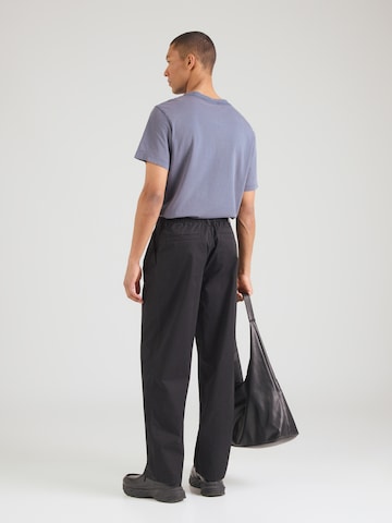 Calvin Klein Jeans Voľný strih Plisované nohavice - Čierna