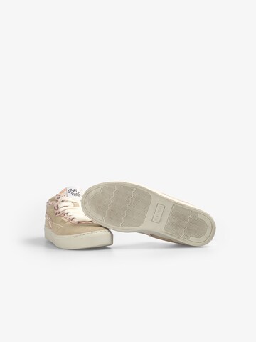 Sneaker di Scalpers in beige