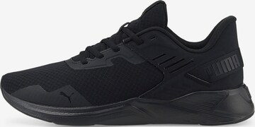 Chaussure de sport PUMA en noir : devant