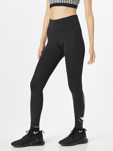 Skinny Pantaloni sport de la NIKE pe negru: față