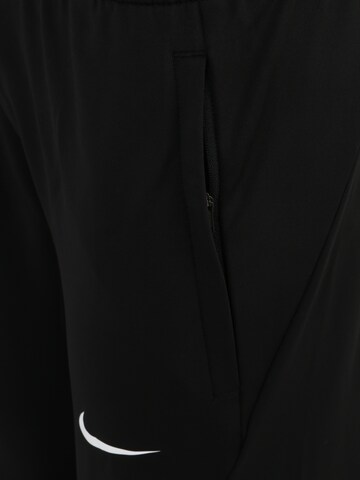 NIKE Slim fit Sports trousers 'Strike' in Black