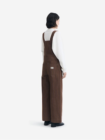 Wide leg Pantaloni con pettorina 'Lume' di Thinking MU in marrone