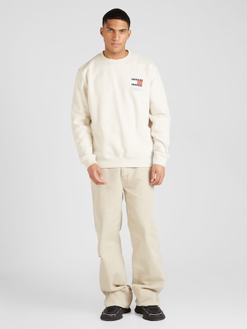 Tommy JeansSweater majica 'Essential' - bež boja