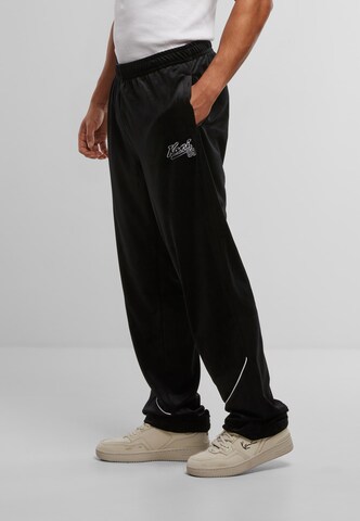 regular Pantaloni sportivi di Karl Kani in nero