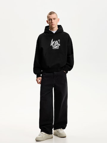 Sweat-shirt Bershka en noir