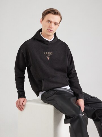 GUESS Originals Tréning póló 'BAKER' - fekete: elől