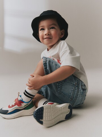 Baskets Next en blanc