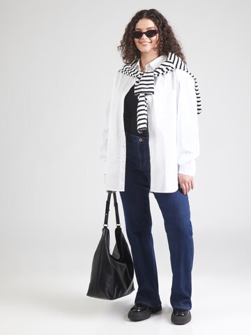 ONLY Carmakoma Flared Jeans 'CARTHUNDER' in Blue