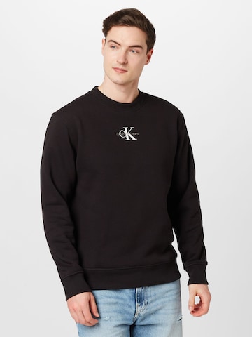 Sweat-shirt Calvin Klein Jeans en noir : devant