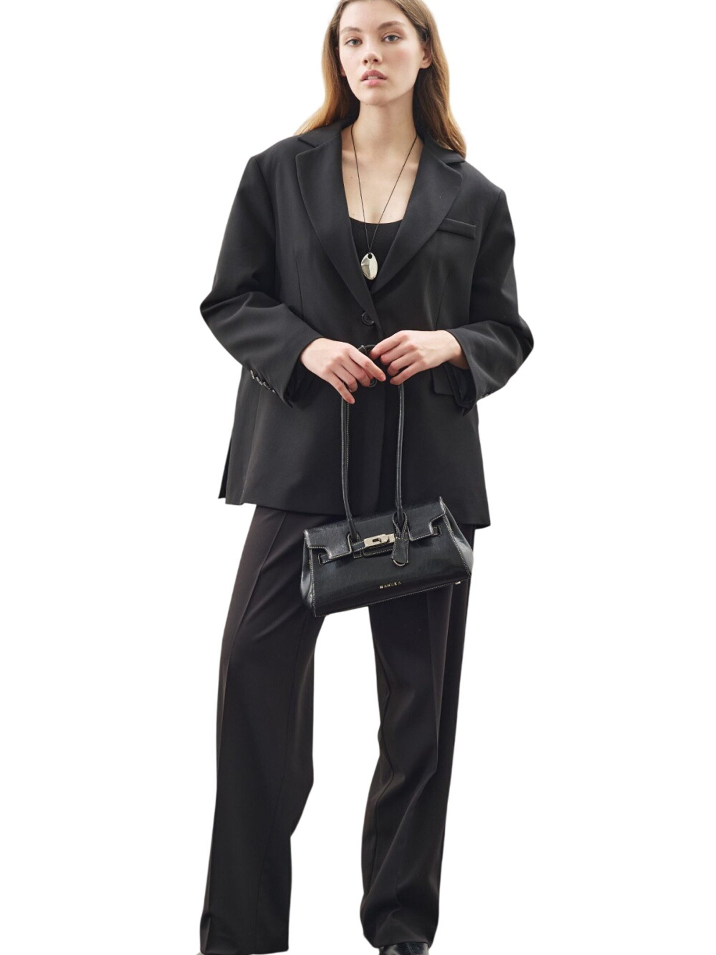 MANUKA Regular Trousers in Black: front