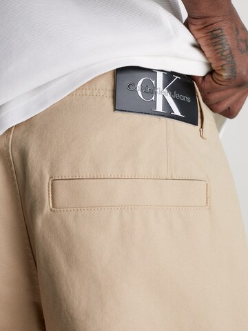 Calvin Klein Jeans Loosefit Cargobroek in Beige
