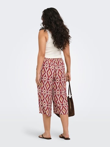 ONLY Carmakoma Loose fit Pleat-Front Pants 'CARMIKASI' in Red