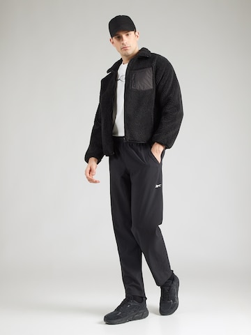 Reebok Szabványos Sportnadrágok 'ID TRAIN' - fekete