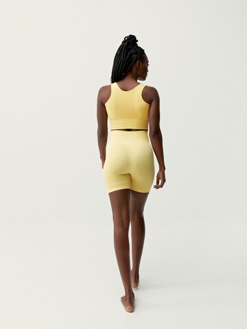 Born Living Yoga Skinny Workout Pants 'Urdhva' in Yellow