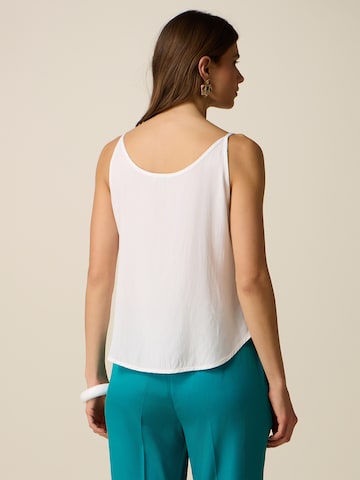 Haut oltre en blanc
