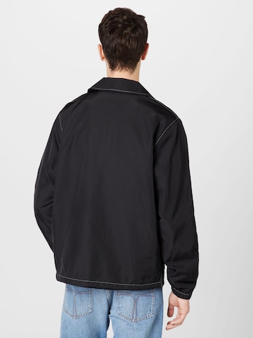 Veste mi-saison 'Lamar' WEEKDAY en noir