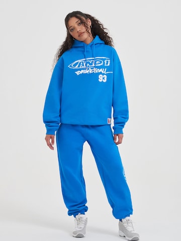 Effilé Pantalon fonctionnel AND1 en bleu