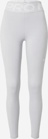 Pantaloni sportivi di NIKE in grigio: frontale