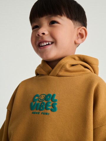 Next Joggingpak in Bruin