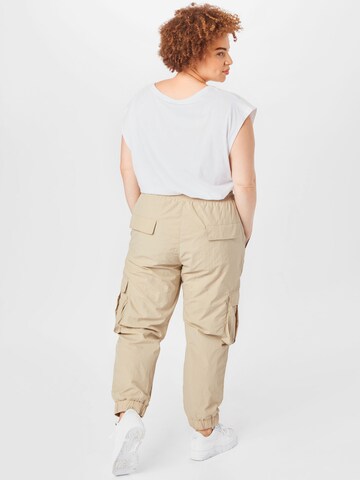 Tapered Pantaloni cargo di Urban Classics in beige