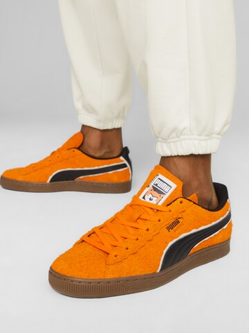 Baskets basses PUMA en orange : devant